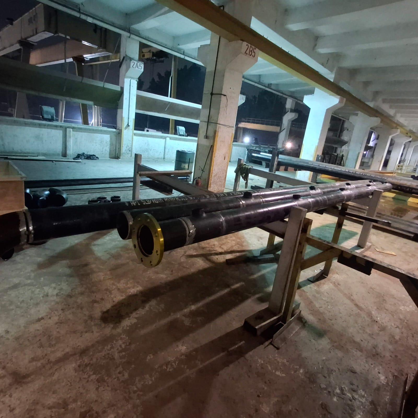 Fabrication and flange alignment of heavy-wall carbon steel header spools
